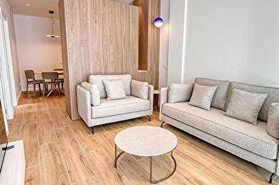 Elegant apartment with community swimming pool  150 meters from the sea.