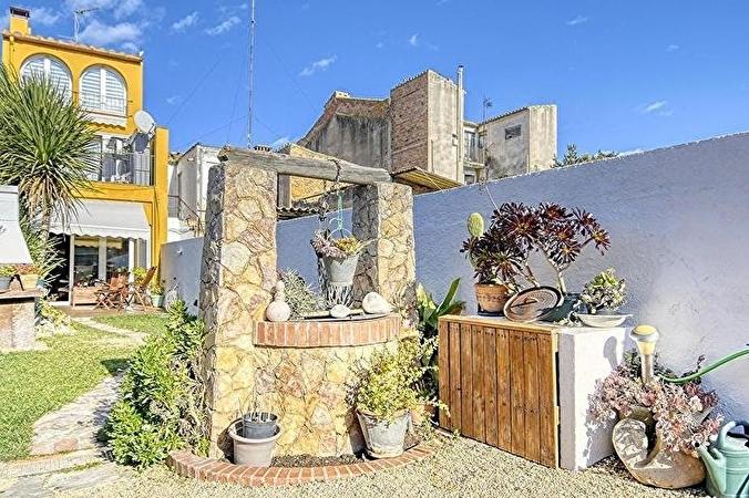 Fabulosa casa de poble estil rústic amb jardí