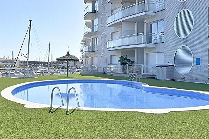 Fantàstic apartament amb jardí i piscina comunitària